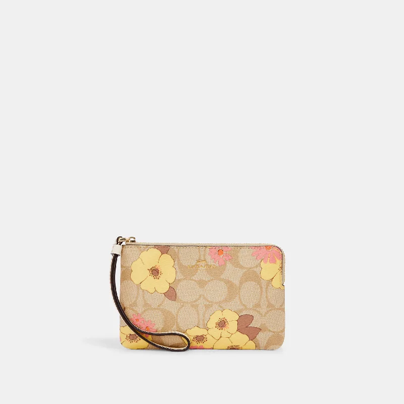 Coach Outlet Corner Zip Wristlet In Signature Canvas With Floral Cluster Print