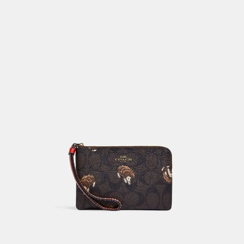 Coach Outlet Corner Zip Wristlet In Signature Canvas With Hedgehog Print