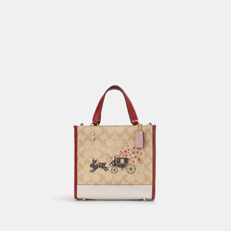 Coach Outlet Lunar New Year Dempsey Tote 22 In Signature Canvas With Rabbit And Carriage