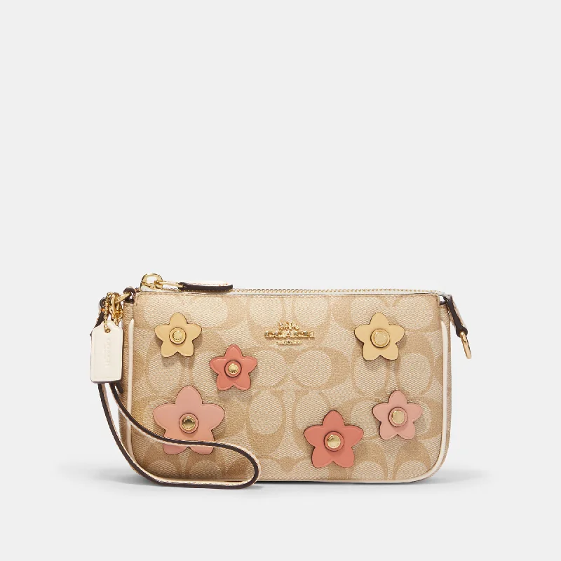 Coach Outlet Nolita 19 In Signature Canvas With Floral Applique